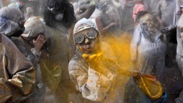 Revellers celebrate "Ash Monday" by participating in a colourful "flour war"