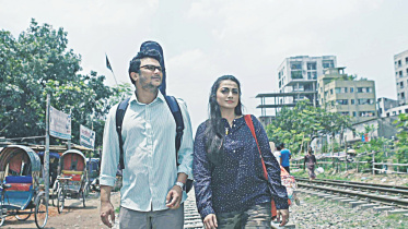 Ghumonto Shohore 1.jpg