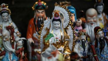 Hong Kong, Unwanted gods ,unwanted statues of deities, retired butcher