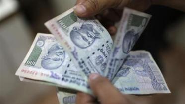 India's rupee slides.jpg