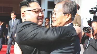 kim talks.jpg