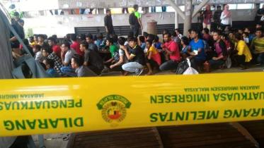 Malaysian immigration police.jpg