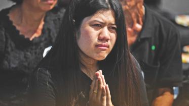 mourner cries thai king Bhumibol.jpg