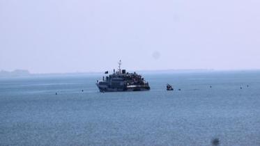 A tourist vessel stuck in Naf River