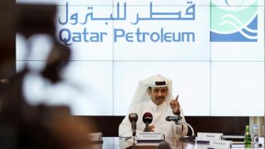 Oil giants shower Qatar.jpg
