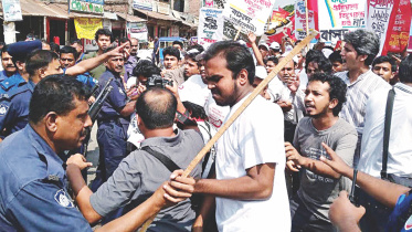 Police charge batons.jpg