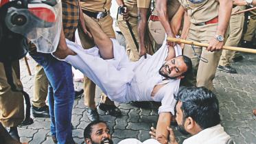 Police remove members.jpg