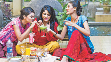 Profiteroles, Hibiscus and flaming red daisies –a garden party to relish