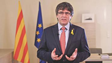 Puigdemont urges.jpg
