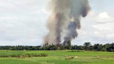 Rohingya village burning.jpg
