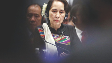 Suu Kyi calls peace.jpg