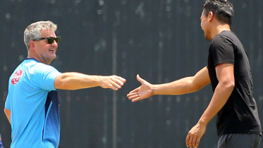 Pacer Taskin Ahmed with coach Steve Rhodes