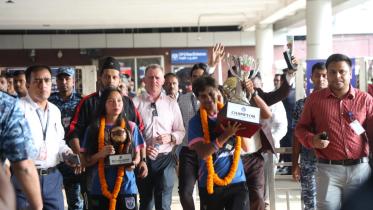 Bangladesh women's football team returns home