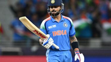 Kohli becomes fastest to reach 14k runs