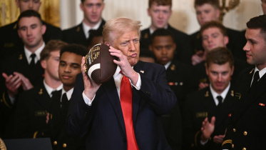 trump_holds_a_football.jpg