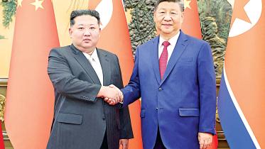 chinese-president-xi-jinping-and-kim-jong-un.jpg