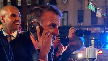 Macron waits in the streets.jpg