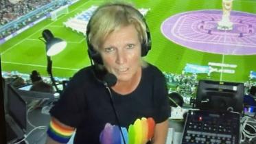 Commentator wears rainbow.jpg