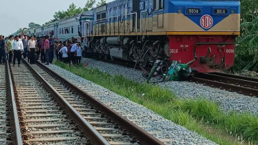 Train hits auto-rickshaw.jpg