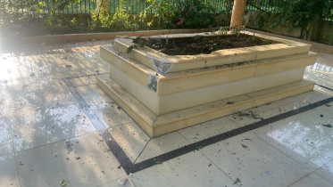 Ctg graveyard of Mainuddin Khan Badal vandalized.jpg