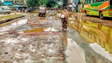 Roads in Palbari-Manihar stretch turn risky due to potholes in Jashore town.jpg