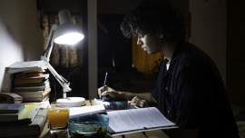A person studying late at night