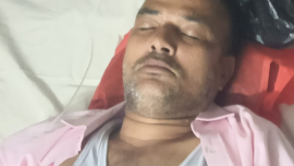 Abul Kalam Azad, a local BNP leader, is undergoing treatment at Naogaon Sadar Hospital. Photo: Collected