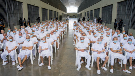 Members of Mara Salvatrucha, also known as MS-13 gang, attend an open hearing by El Salvador prosecutors against 486 members of the gang, who are accused of more than 47,000 crimes committed between 2012 and 2022. Photo: Reuters
