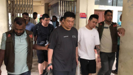 Chinese_arrested.jpg