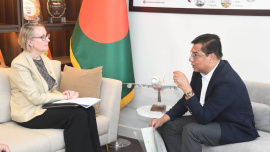 Civil Aviation and Tourism Minister M Rashiduzzaman Millat with British High Commissioner Sarah Cooke at his Secretariat office in Dhaka today. Photo: Courtesy