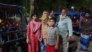 Megha, 13 and Gopal, 8 alongside their relatives and neighbours following the death of their father. Photo: Star