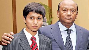 Latifur Rahman with his grandson Faraaz.jpg