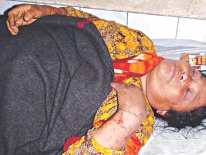 son beats mother.jpg