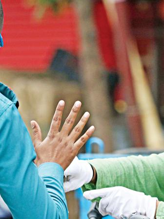 A policeman stops a biker 