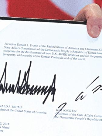 trump_kim_sign.jpg