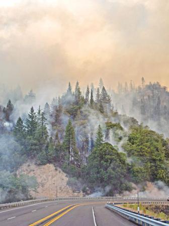 Wildfire continues to burn