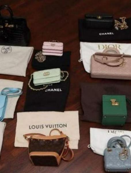 Singapore Police seized were more than 250 luxury bags and watches. PHOTO: SINGAPORE POLICE FORCE